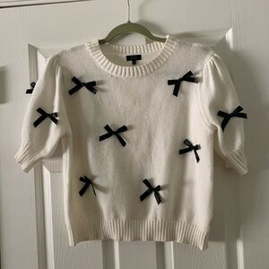 White Sweater with Black Bow Detail